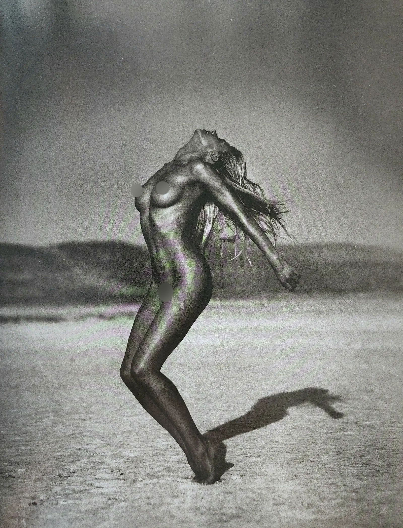 Model Print: Model Print. Andreas H. Bitesnich (Austrian, b. 1964). Heliogravure. Printed in 2001, Italy. 13.00 x 10.00 inches. Please be aware that all lots in our auctions are sold "AS IS," in accordance with th