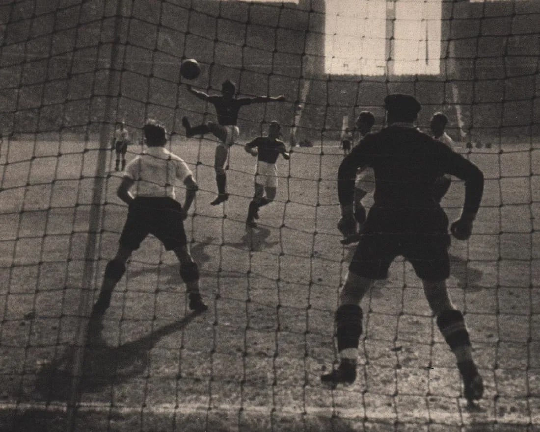 Leni Riefenstahl (German,1902-2003) Print: Leni Riefenstahl (German,1902-2003) Print. A Header to Austria's Goal. Printed in 1937. 7.50 x 6.00 inches. Please be aware that all lots in our auctions are sold "AS IS," in accordance with the