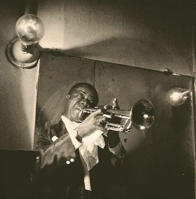 Jeanloup Sieff (France,1933-2000) Print: Jeanloup Sieff (France,1933-2000) Print. Louis Armstrong, Paris, "1955". Printed in 1982. 6.50 x 6.50 inches. Please be aware that all lots in our auctions are sold "AS IS," in accordance with the Ter