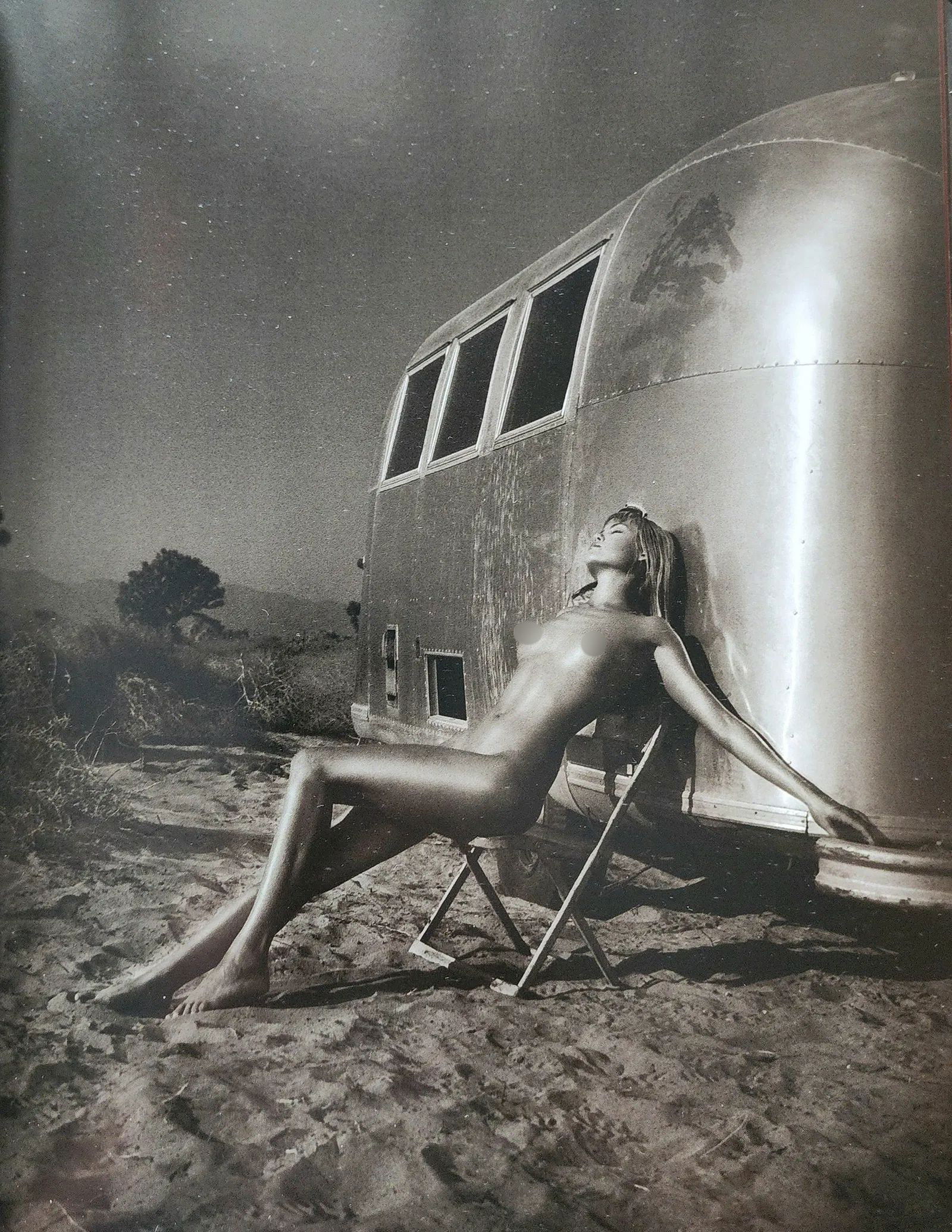 Model Print: Model Print. Andreas H. Bitesnich (Austrian, b. 1964). Heliogravure. Printed in 2001, Italy. 13.00 x 10.00 inches. Please be aware that all lots in our auctions are sold "AS IS," in accordance with