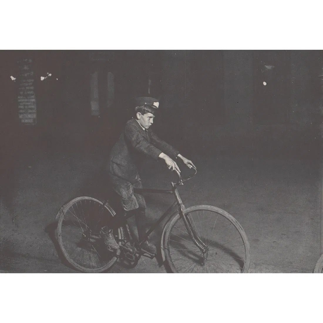 Lewis W. Hine (American,1874-1940) Print: Lewis W. Hine (American,1874-1940) Print. HINE (American,1874-1940) Print. Young Messenger Boy on Bicycle, c. 1913. Printed in 1970. 5.00 x 7.00 inches. Please be aware that all lots in our auctions a