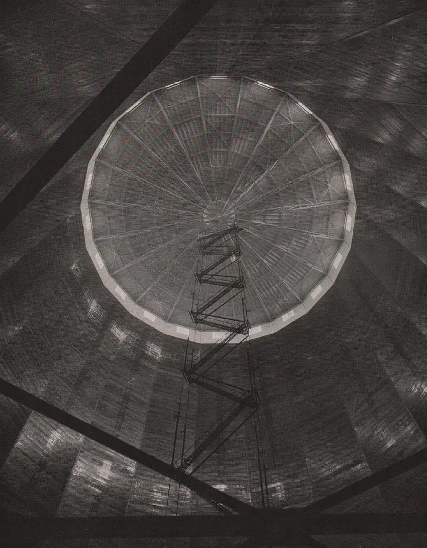 Ernst Scheel (German,1903–1980 ) Print: Ernst Scheel (German,1903–1980 ) Print. Hochblick im Gasbehalter. Printed in 1937. 8” x 6” inches. Please be aware that all lots in our auctions are sold "AS IS," in accordance with the