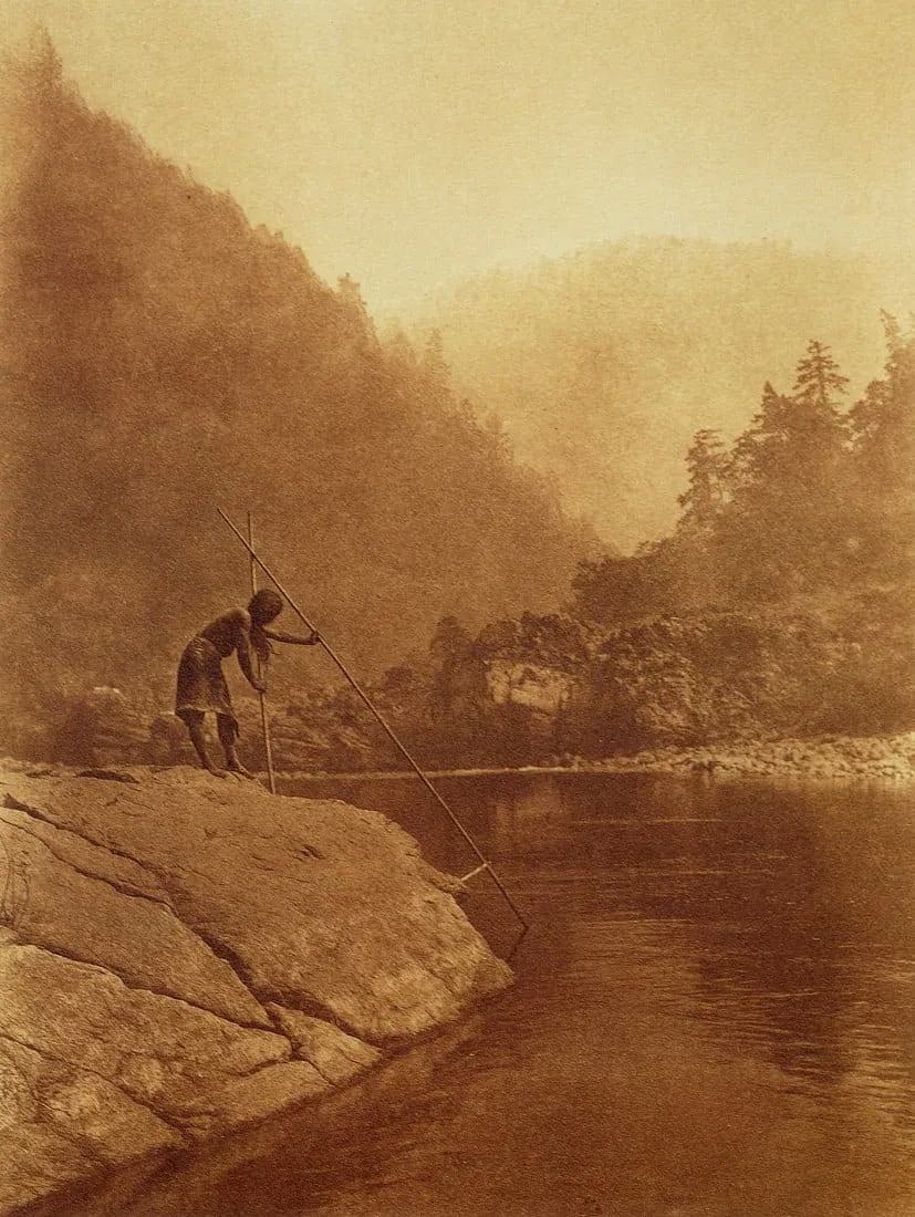 Edward Curtis (American ,1868 – 1952) Print: Edward Curtis (American ,1868 – 1952) Print. Dip-Netting at the Sugar Bowl, "1923". Printed in 2000. 6.95 x 9.25 inches. Please be aware that all lots in our auctions are sold "AS IS," in