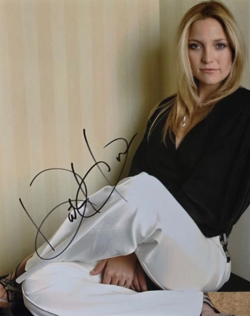 Kate Hudson (American, b. 1979) Photograph: Kate Hudson (American, b. 1979) Photograph. Signed in marker. Please be aware that all lots in our auctions are sold "AS IS," in accordance with the Terms & Conditions of the Auction. All "dates"