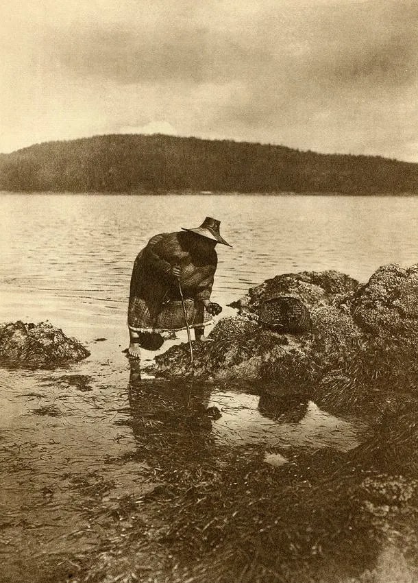 Curtis, Edward S (American,1868-1952) Print: Curtis, Edward S (American,1868-1952) Print. Gathering Abalones Nakoaktok. Printed in 1973. 7.50 x 10.00 inches. Please be aware that all lots in our auctions are sold "AS IS," in accordance with the