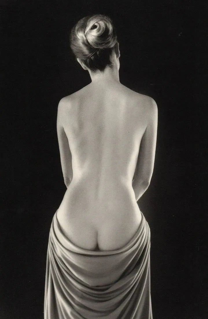 Ruth Bernhard (American,1905-2006) Print: Ruth Bernhard (American,1905-2006) Print. Draped Torso, "1962". Photogravure, Printed in 1986, USA. 9.00 x 6.00 inches. Printed during the artistâ€™s lifetime. Not hand-signed unless 