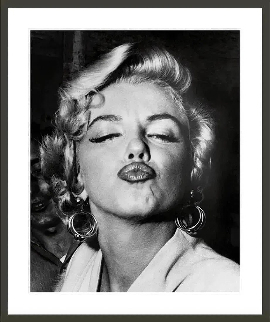Weegee (Austrian-American, 1899-1968) Marilyn Monroe Print: Weegee (Austrian-American, 1899-1968) Marilyn Monroe Print. 26.00 x 32.25 (sight), 33.25 x 40.00 (framed) inches. Not hand-signed unless otherwise stated. Lots that contain nudity have been partially 