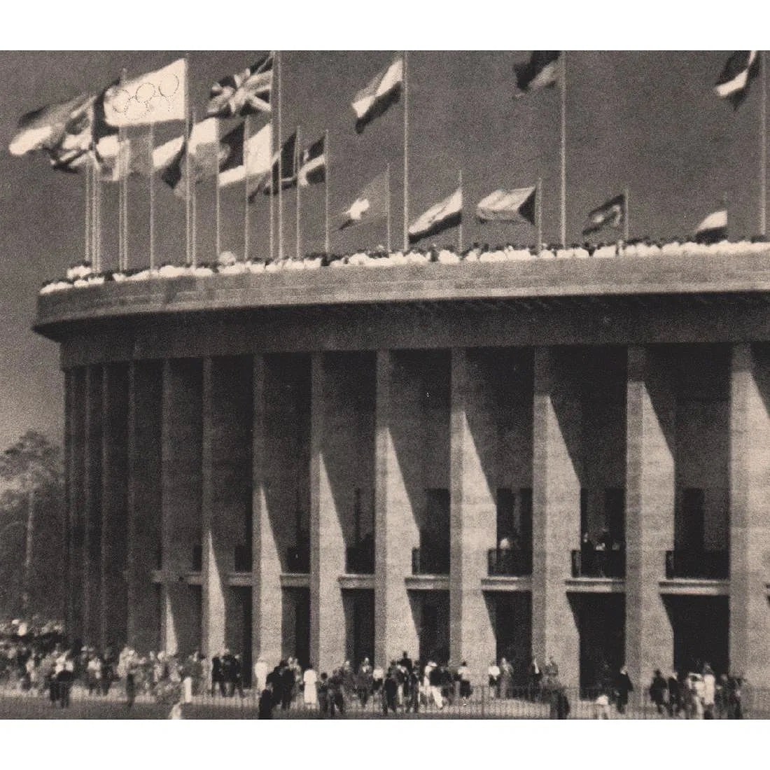 Leni Riefenstahl (German, 1902-2003 ) Print: Leni Riefenstahl (German, 1902-2003 ) Print. The Flags of the Nations. Photogravure, Printed in 1937, Germany. 7.50 x 6.25 inches. Not hand-signed unless otherwise stated. Lots that contain nudity
