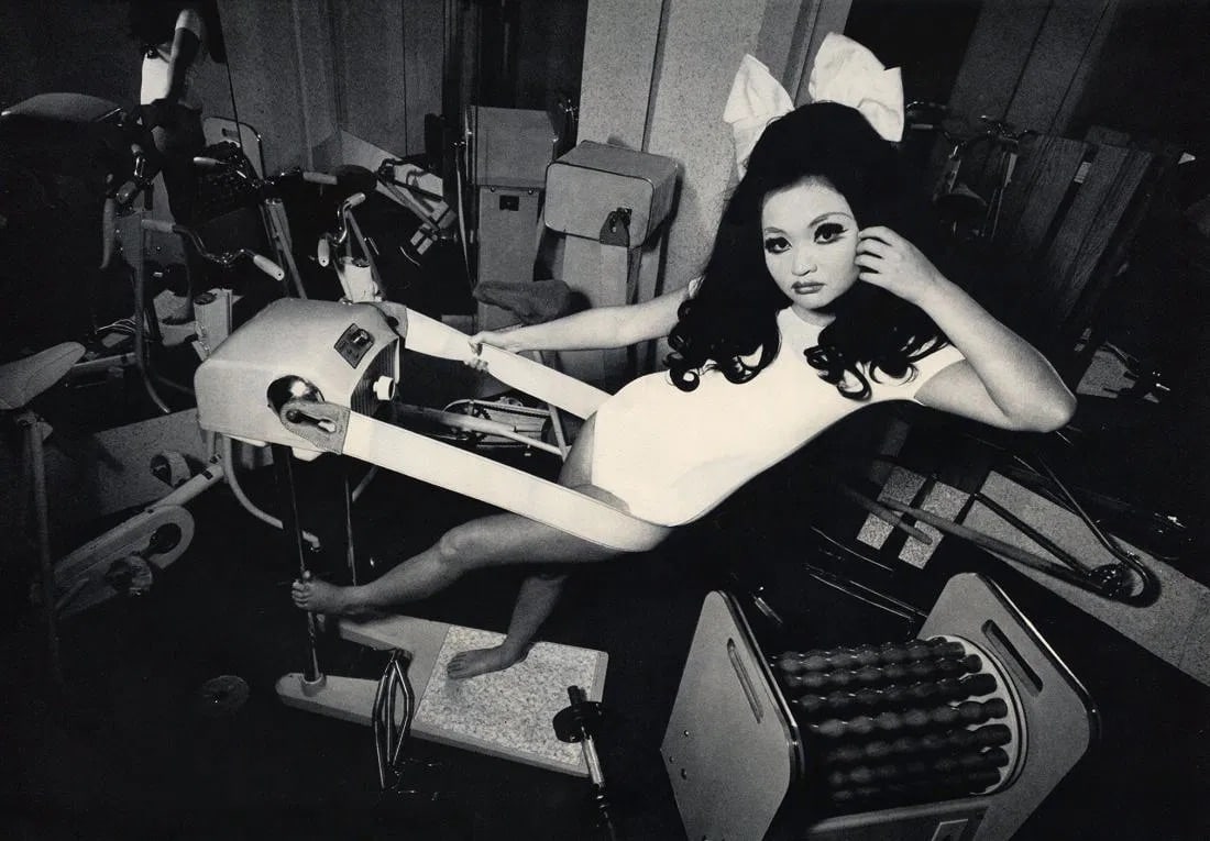 Kishin Shinoyama (Japanese, 1940-2024) Print: Kishin Shinoyama (Japanese, 1940-2024) Print. "Workout". Printed in 1968. 8" x 14" inches. Not hand-signed unless otherwise stated. Photomechanical Print. Lots that contain nudity have been partially 