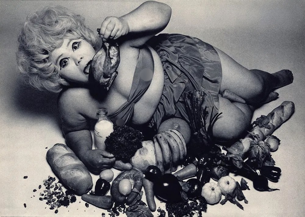 Kishin Shinoyama (Japanese, 1940-2024) Print: Kishin Shinoyama (Japanese, 1940-2024) Print. Eat! Eat!. Printed in 1968. 8" x 14" inches. Not hand-signed unless otherwise stated. Photomechanical Print. Lots that contain nudity have been partially 