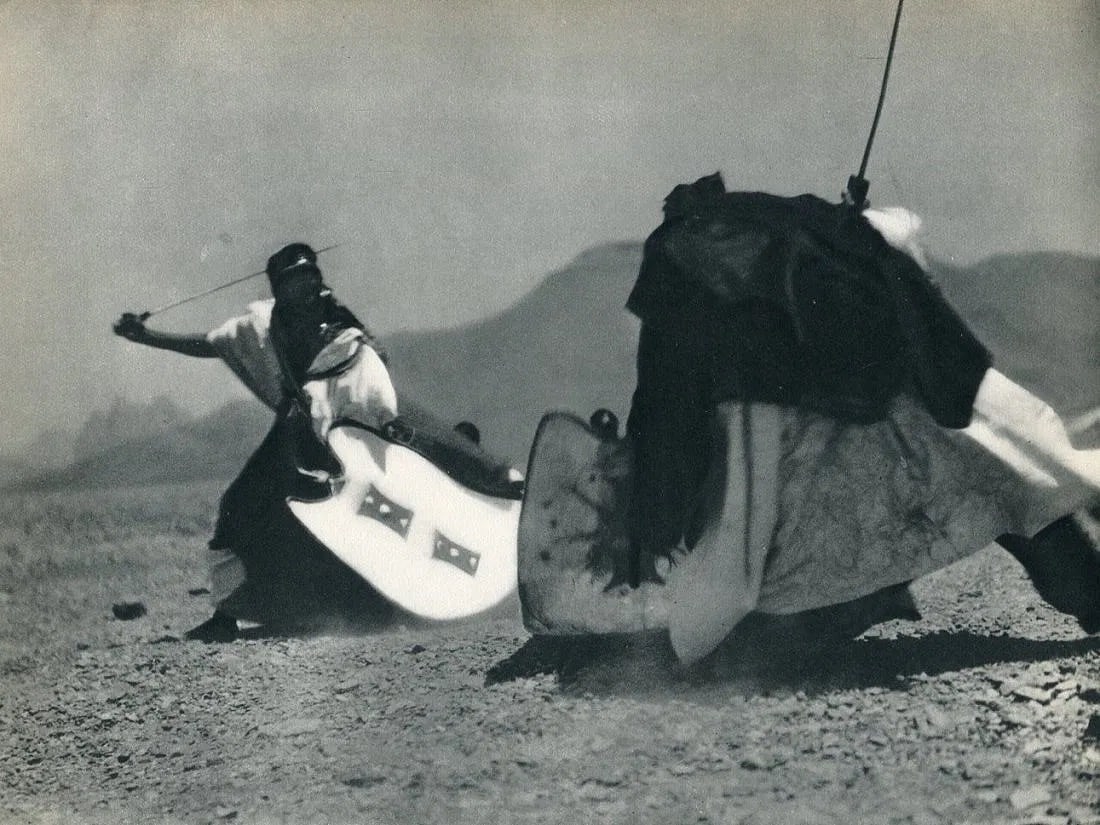 Ichac, Pierre (France, 1901-1978) Print: Ichac, Pierre (France, 1901-1978) Print. Ahaggar Tuaregs - Sword Fight. Printed in 1931. 9" x 6" inches. Not hand-signed unless otherwise stated. Photomechanical Print. Lots that contain nudity have b