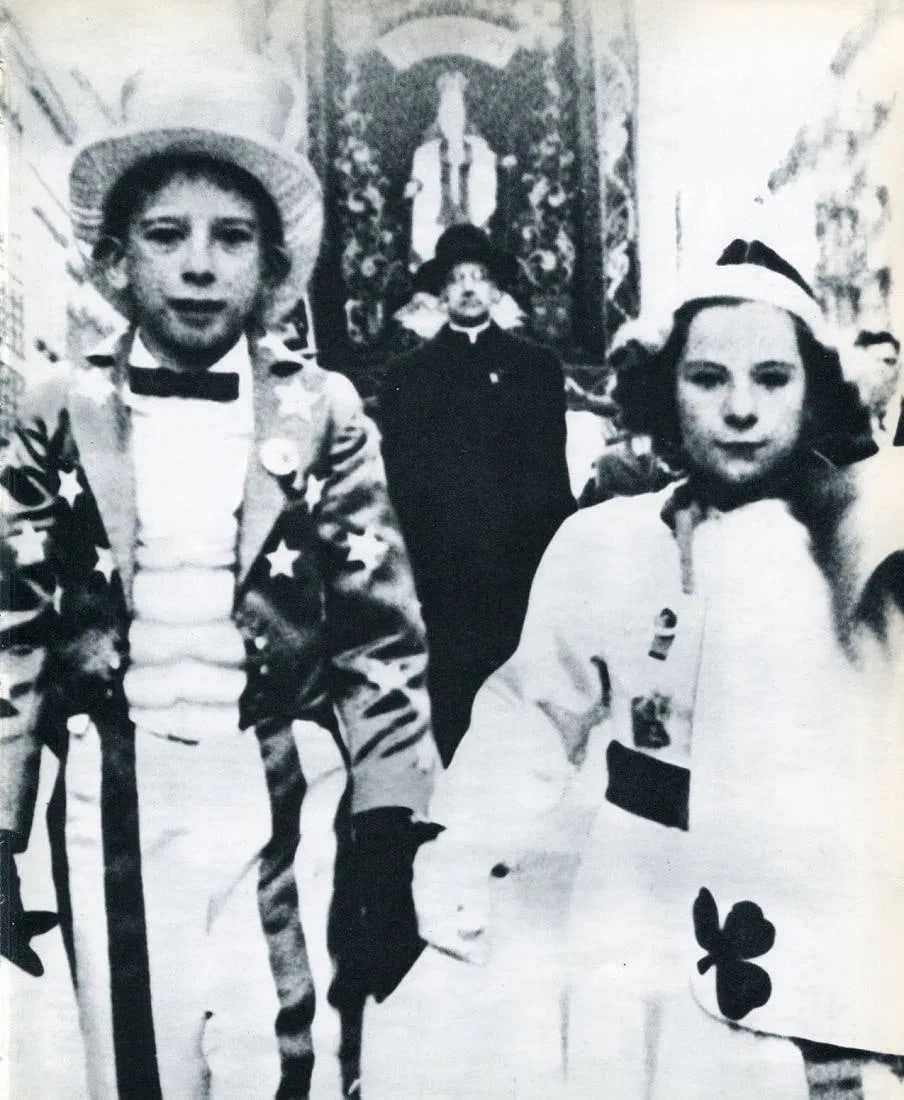 William Klein (American-French, 1926- 2022) Print: William Klein (American-French, 1926- 2022) Print. Parade, NYC. Printed in 1956. 8" x 10.5" inches. Not hand-signed unless otherwise stated. Photomechanical Print. Lots that contain nudity have been p