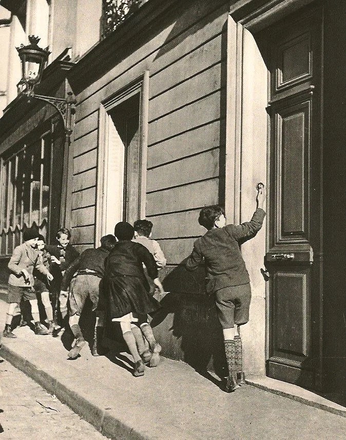 Robert Doisneau (French, 1912-1994) Print: Robert Doisneau (French, 1912-1994) Print. The Bell. Printed in 1979. 7" X 9" inches. Not hand-signed unless otherwise stated. Photomechanical Print. Lots that contain nudity have been partially
