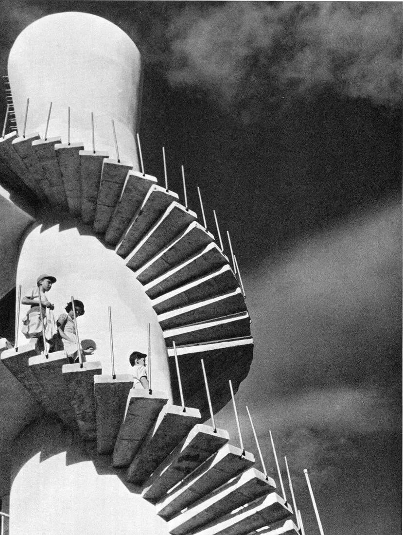 Reeves J. Guillermo Print: Reeves J. Guillermo Print. Tower Adventure, Argentinal. Printed in 1958. 9 x 11 inches. Not hand-signed unless otherwise stated. Photomechanical Print. Lots that contain nudity have been partially