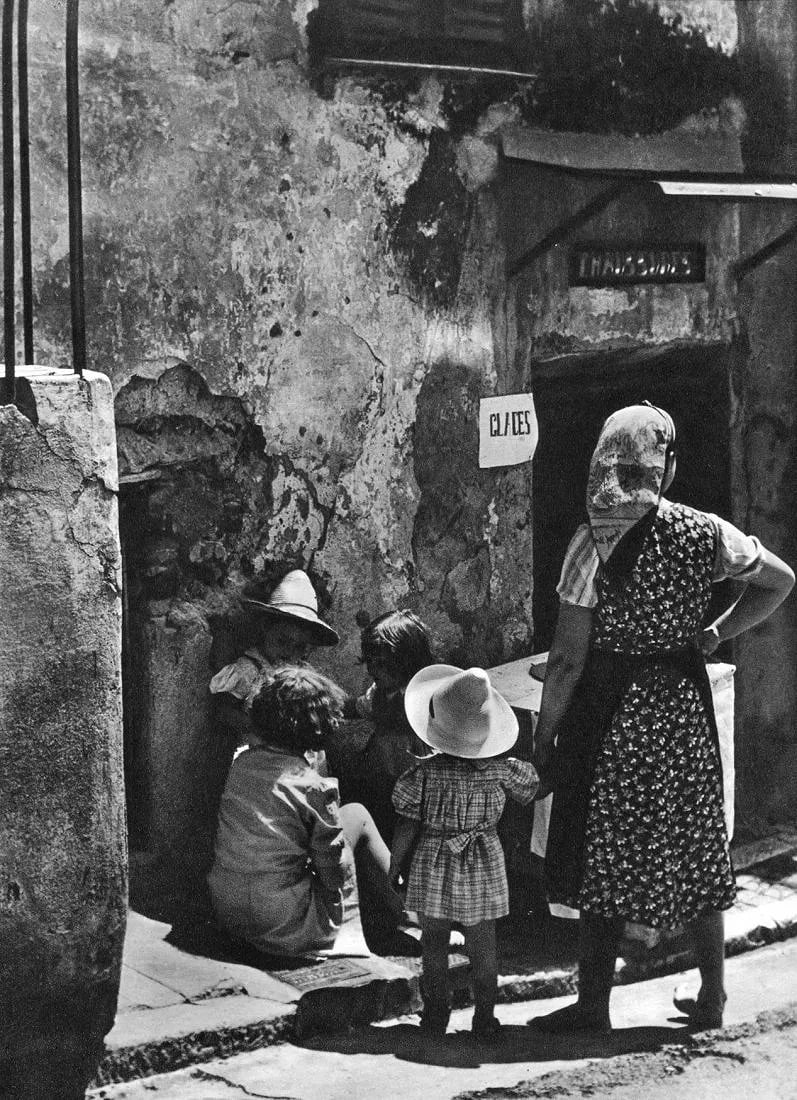 G. M. La Rivière (French) Print: G. M. La Rivière (French) Print. In The Alley - Gravure. Printed in 1954. 9 x 12 inches. Not hand-signed unless otherwise stated. Photomechanical Print. Lots that contain nudity have been partially o