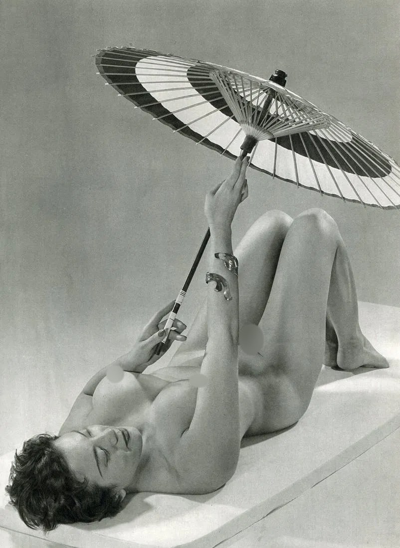 Theda & Emerson Hall Print: Theda & Emerson Hall Print. Nude - gravure. Printed in 1950. 8.5 x 12 inches. Not hand-signed unless otherwise stated. Photomechanical Print. Lots that contain nudity have been partially obscured in t