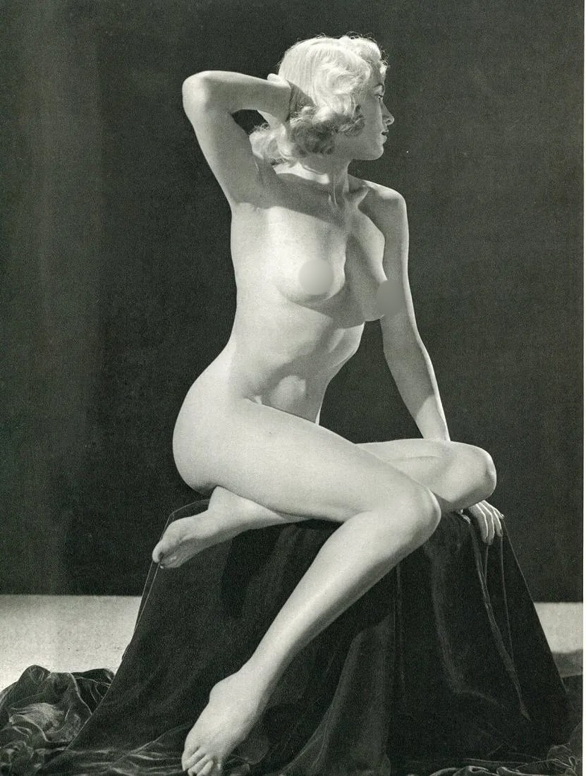 Theda & Emerson Hall Print: Theda & Emerson Hall Print. Nude - gravure. Printed in 1950. 8.5 x 12 inches. Not hand-signed unless otherwise stated. Photomechanical Print. Lots that contain nudity have been partially obscured in