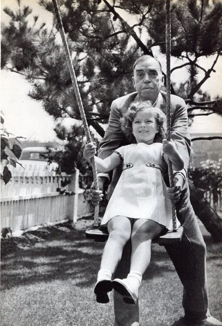 Carola Rust Print: Carola Rust Print. Shirley Temple & Irvin Cobb. Printed in 1936. 8 x 10.5 inches. Not hand-signed unless otherwise stated. Photomechanical Print. Lots that contain nudity have been partially obscured