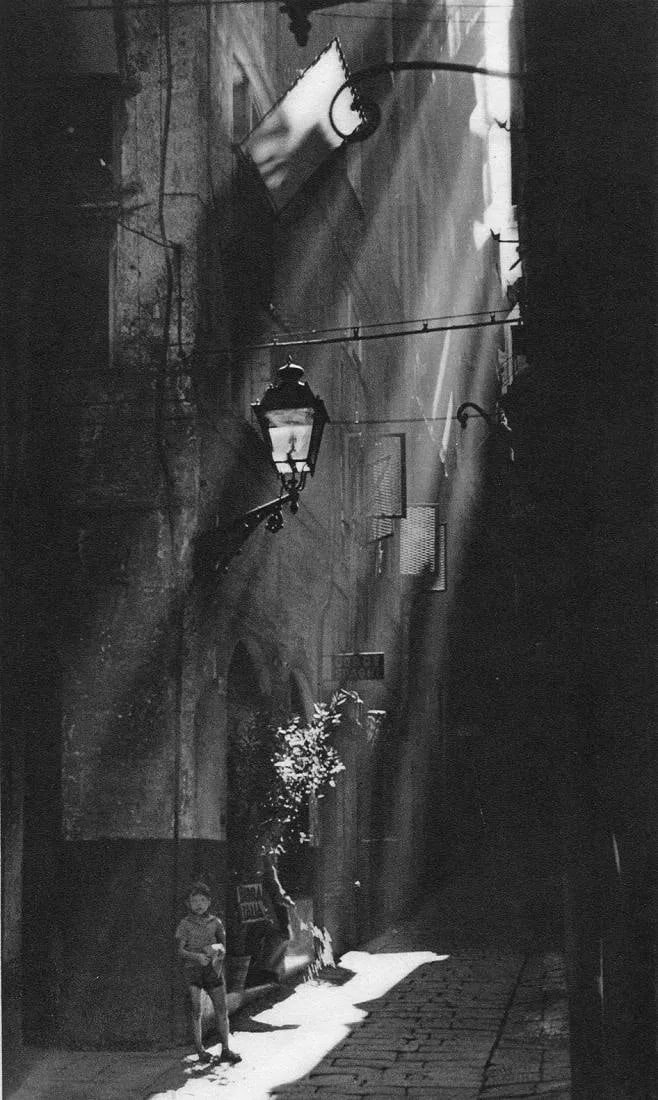 Goursat (French, 1858-1936) Print: Goursat (French, 1858-1936) Print. Sunlight in the Alley - Gravure. Printed in 1936. 6 x 10 inches. Not hand-signed unless otherwise stated. Photomechanical Print. Lots that contain nudity have been