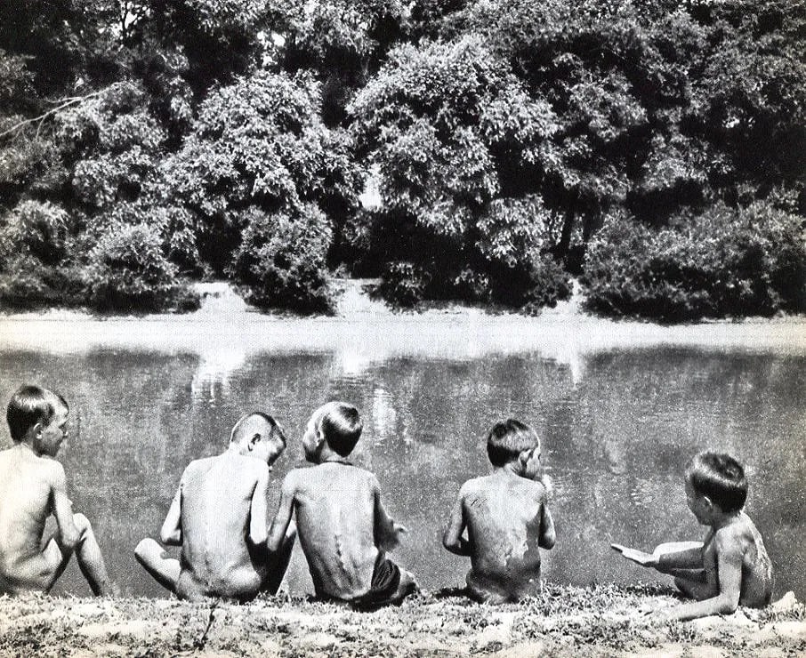 Andre Kertesz (Hungarian, 1894-1985) Print: Andre Kertesz (Hungarian, 1894-1985) Print. Boys on the river bank. Printed in 1933. 7 x 9 inches. Not hand-signed unless otherwise stated. Photomechanical Print. Lots that contain nudity have been pa