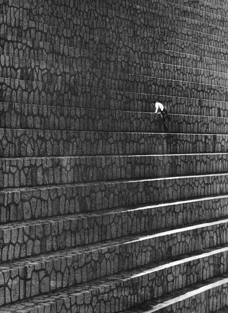 Alfred Eisenstaedt (American, 1898-1995) Print: Alfred Eisenstaedt (American, 1898-1995) Print. Boy on stairs - Gravure. Printed in 1936. 8 x 11 inches. Not hand-signed unless otherwise stated. Photomechanical Print. Lots that contain nudity have