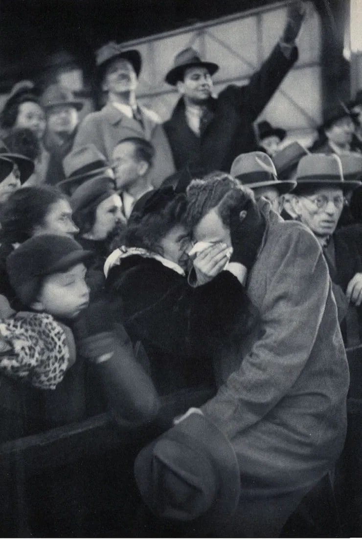 Henri Cartier-Bresson (French, 1908-2004) Print: Henri Cartier-Bresson (French, 1908-2004) Print. Refugee Reunion - NY 1946. Printed in 1955. 10 x 13 inches. Not hand-signed unless otherwise stated. Photomechanical Print. Lots that contain nudity