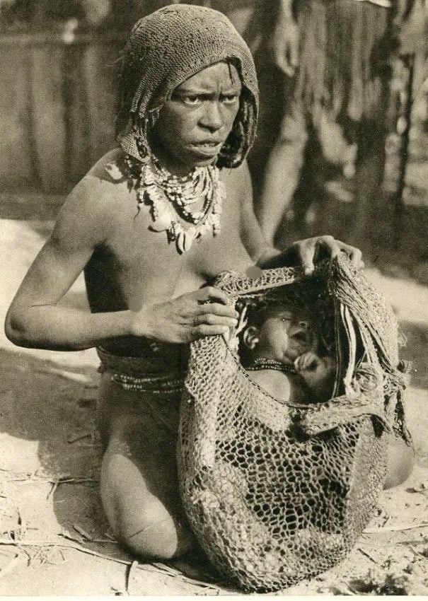 Hugo Adolf Bernatzik (Austrian, 1897-1953) Print: Hugo Adolf Bernatzik (Austrian, 1897-1953) Print. Salomon Island Native Mother. Printed in 1934. 4.50 x 6.00 inches Not hand-signed unless otherwise stated. Photomechanical Print. Lots that contain nu