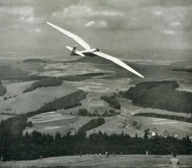 Alex Stocker Print: Alex Stocker Print. Wasserkuppe Mountain. Printed in 1938. 7.00 x 6.00 inches Not hand-signed unless otherwise stated. Photomechanical Print. Lots that contain nudity have been partially obscured in