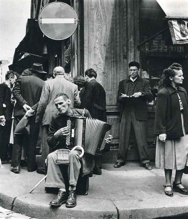 Robert Doisneau (French, 1912-1994) Print: Robert Doisneau (French, 1912-1994) Print. Rue Musician Mouffetard. Printed in 1979. 7.00 x 7.50 inches Not hand-signed unless otherwise stated. Photomechanical Print. Lots that contain nudity have be