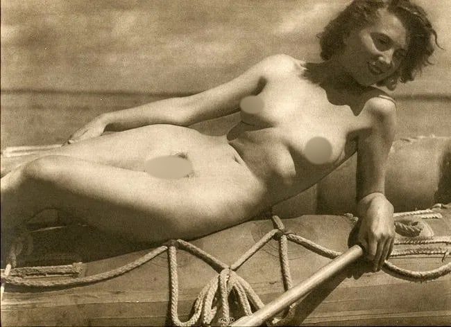 Horts Greschik Print: Horts Greschik Print. Female Nude in Raft. Printed in 1952. 12 x 9 inches Not hand-signed unless otherwise stated. Photomechanical Print. Lots that contain nudity have been partially obscured in the