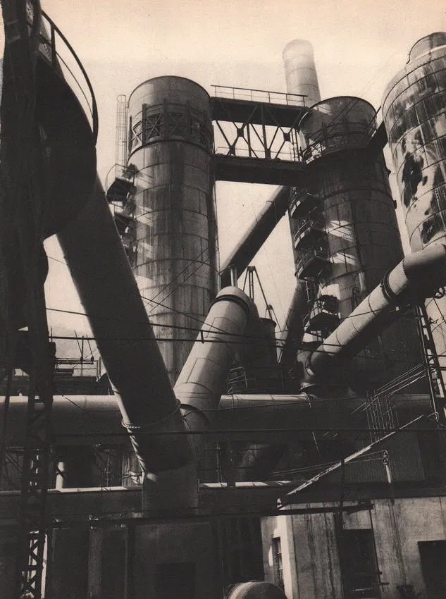 Germaine Krull (attr) (German-born, 1897-1985) Print: Germaine Krull (attr) (German-born, 1897-1985) Print. Factory-France Hussigny. Printed in 1931. 90 x 12.00 inches Not hand-signed unless otherwise stated. Photomechanical Print. Lots that contain