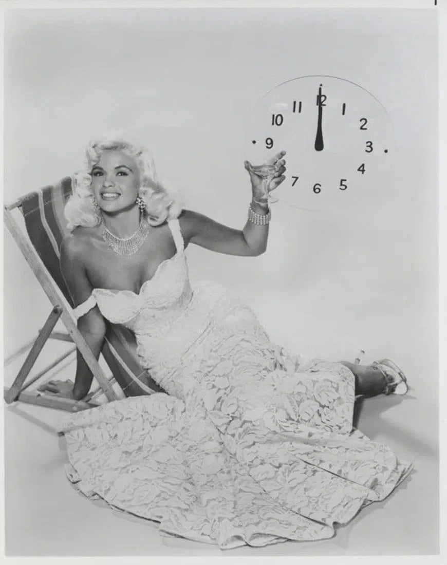 Jayne Mansfield (American, 1933-1967) Silver Gelatin: Jayne Mansfield (American, 1933-1967) Silver Gelatin. New Years Celebration, "1956". 8.00 x 10.00 inches. Printed after the 1950's. Not hand-signed unless otherwise stated. Photomechanical Print. Lots