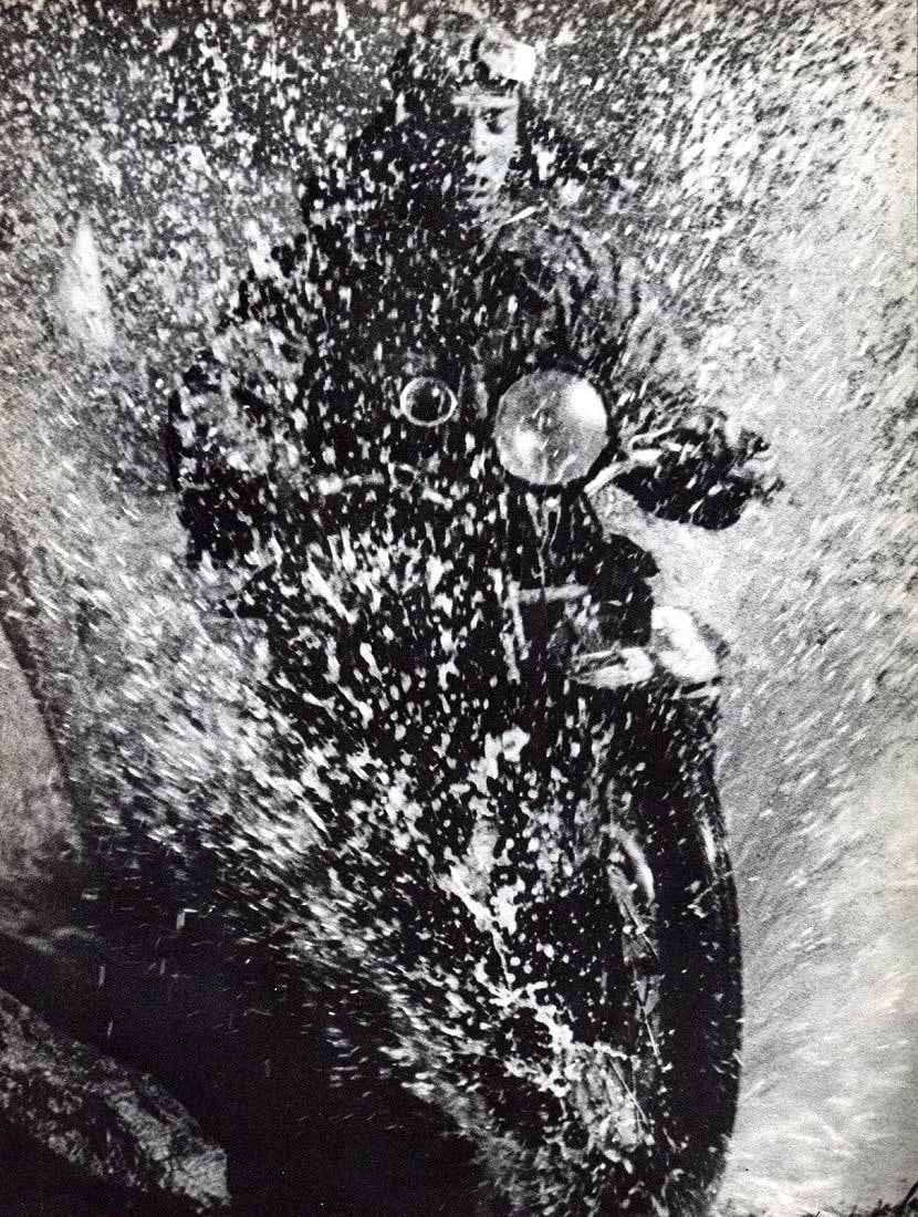 Martin Munkacsi Print: Martin Munkacsi Print. Motorcycle Rider. Printed in 1931. 9.00 x 11.00 inches Not hand-signed unless otherwise stated. Photomechanical Print. Lots that contain nudity have been partially obscured in