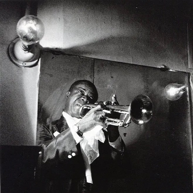 Jeanloup Sieff (Japanese, 1890-1974) Print: Jeanloup Sieff (Japanese, 1890-1974) Print. Louis Paris Armstrong. Printed in 1982. 7 x 7" inches Not hand-signed unless otherwise stated. Photomechanical Print. Lots that contain nudity have been