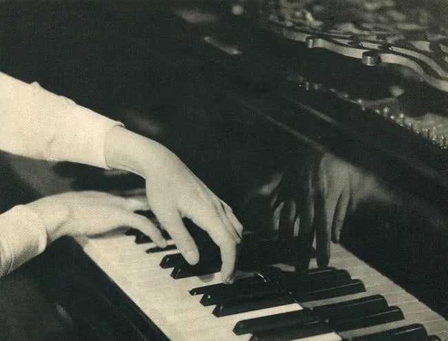 Laure Albin-Guillot (French, 1879–1962) Print: Laure Albin-Guillot (French, 1879–1962) Print. Playing Piano. Printed in 1930. 8. 00 x 6. 00 inches Not hand-signed unless otherwise stated. Photomechanical Print. Lots that contain nudity have
