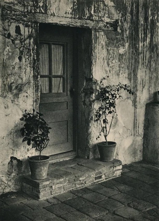 William Mortensen (American, 1897-1965) Print: William Mortensen (American, 1897-1965) Print. Doorway San Juan Capistrano. Printed in 1937. 10.00 x 13.00 inches. Not hand-signed unless otherwise stated. Photomechanical Print. Lots that contain