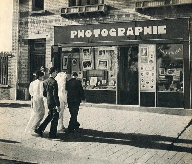 Robert Doisneau (French, 1912- 1994) Print: Robert Doisneau (French, 1912- 1994) Print. Photographie Studio. Printed in 1947. 8.50 x 7.00 inches. Not hand-signed unless otherwise stated. Photomechanical Print. Lots that contain nudity have been