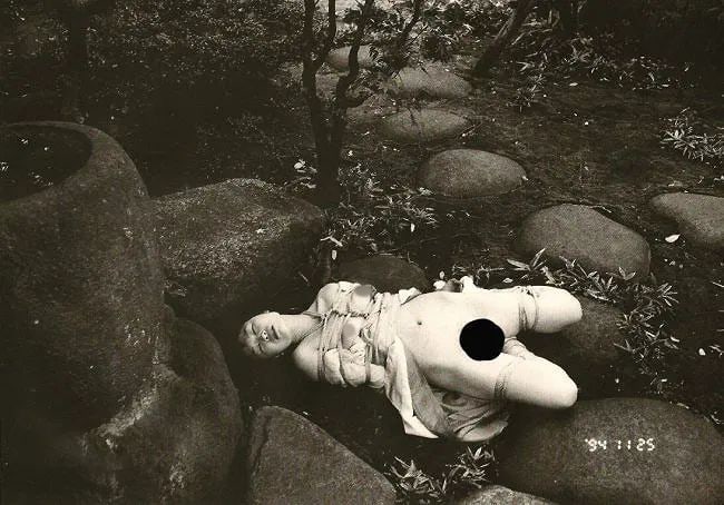 Nobuyoshi Araki (Japanese, b. 1940) Print: Nobuyoshi Araki (Japanese, b. 1940) Print. Bondage. Printed in 1995. 11.00 x 8.00 inches. Not hand-signed unless otherwise stated. Photomechanical Print. Lots that contain nudity have been partially