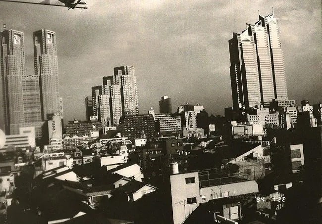 Nobuyoshi Araki (Japanese, b. 1940) Print: Nobuyoshi Araki (Japanese, b. 1940) Print. Cityscape. Printed in 1995. 11.00 x 8.00 inches. Not hand-signed unless otherwise stated. Photomechanical Print. Lots that contain nudity have been