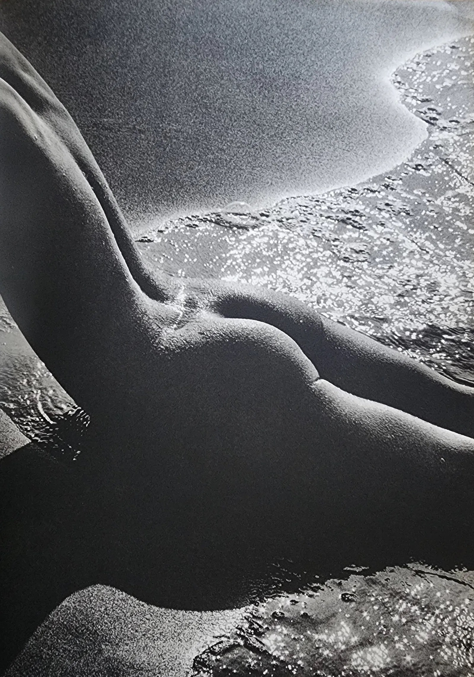 Lucien Clergue (French, 1934-2014) Print: Lucien Clergue (French, 1934-2014) Print. The Beginning, "1973". Printed in 1973, France. 13.00 x 9.00 inches. Photogravure/Heliogravure. Not hand-signed unless otherwise stated. Photomechanical