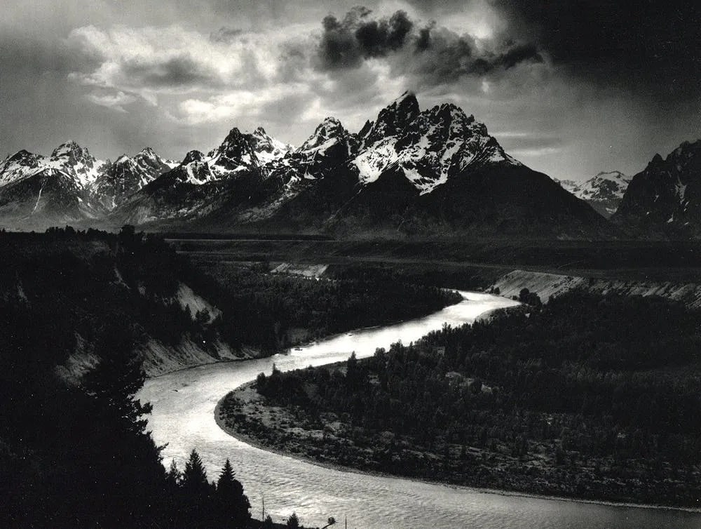 Ansel Adams (American, 1902-1984) Print: Ansel Adams (American, 1902-1984) Print. Tetons and the Snake River. Printed in 1960, USA. 9.00 x 8.00 inches. Photogravure and Color Co. Not hand-signed unless otherwise stated. Photomechanical