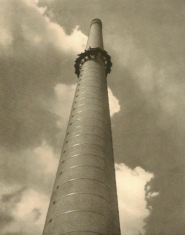 Max Lohrich Print: Max Lohrich Print. Smokestack. Printed in 1931. 6.00 x 7.50 inches. Not hand-signed unless otherwise stated. Photomechanical Print. Lots that contain nudity have been partially obscured in the