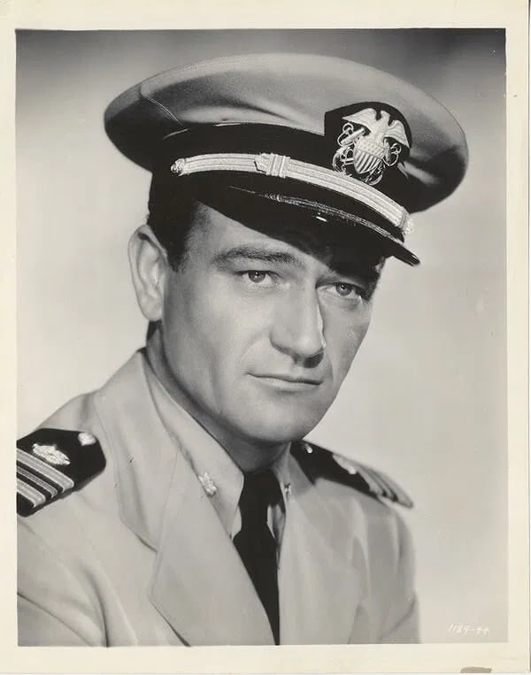 John Wayne (American, 1907-1979) Silver Gelatin: John Wayne (American, 1907-1979) Silver Gelatin. The Fighting Seabees. "1944". 8.00 x 10.00 inches. Photomechanical Print. Lots that contain nudity have been partially obscured in the listing; unblurr