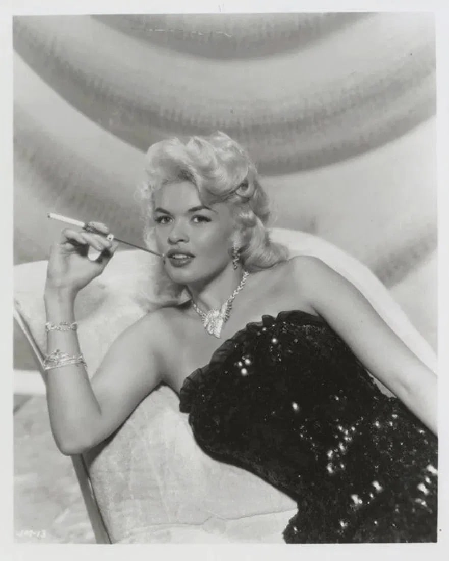 Jayne Mansfield (American, 1933-1967) Silver Gelatin: Jayne Mansfield (American, 1933-1967) Silver Gelatin. 8.00 x 10.00 inches. Printed after the 1950's. Photomechanical Print. Lots that contain nudity have been partially obscured in the listing;