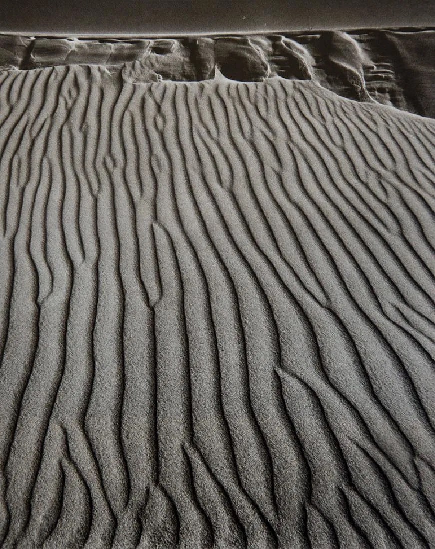 Ansel Adams (American, 1902-1984) Print: Ansel Adams (American, 1902-1984) Print. Sand Dunes, Oceano. Printed in 1976, Great Britain. 7.00 x 8.75 inches. Photogravure. Not hand-signed unless otherwise stated. Photomechanical Print. Lots