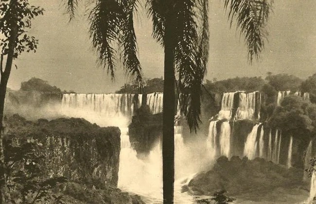 Mario Baldi Print: Mario Baldi Print. Iguassu Falls. Printed in 1937. 9.25 x 6.00 inches. Not hand-signed unless otherwise stated. Photomechanical Print. Lots that contain nudity have been partially obscured in the