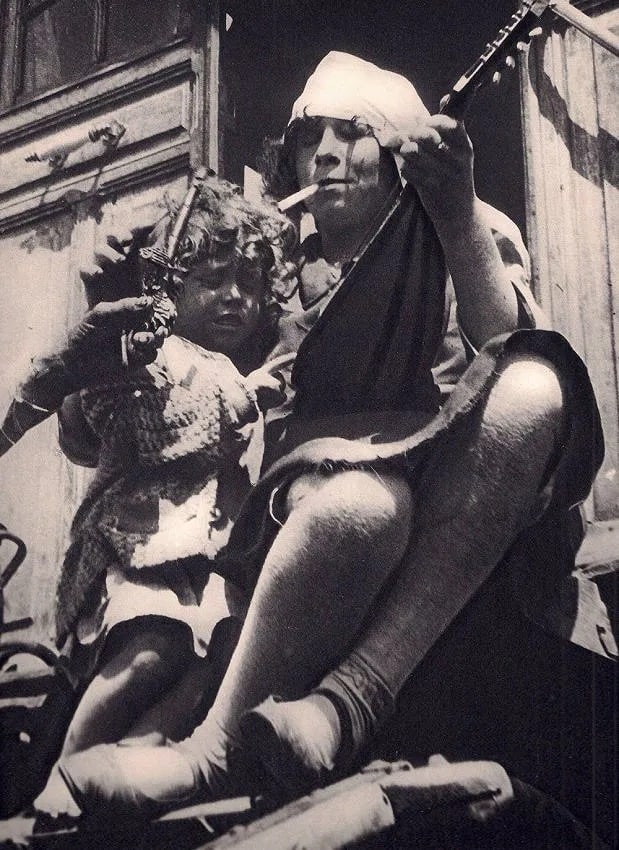 Nora Dumas (Hungarian, 1890-1979) Print: Nora Dumas (Hungarian, 1890-1979) Print. Gypsies. Printed in 1932. 7.50 x 9.50 inches. Not hand-signed unless otherwise stated. Photomechanical Print. Lots that contain nudity have been partially obsc