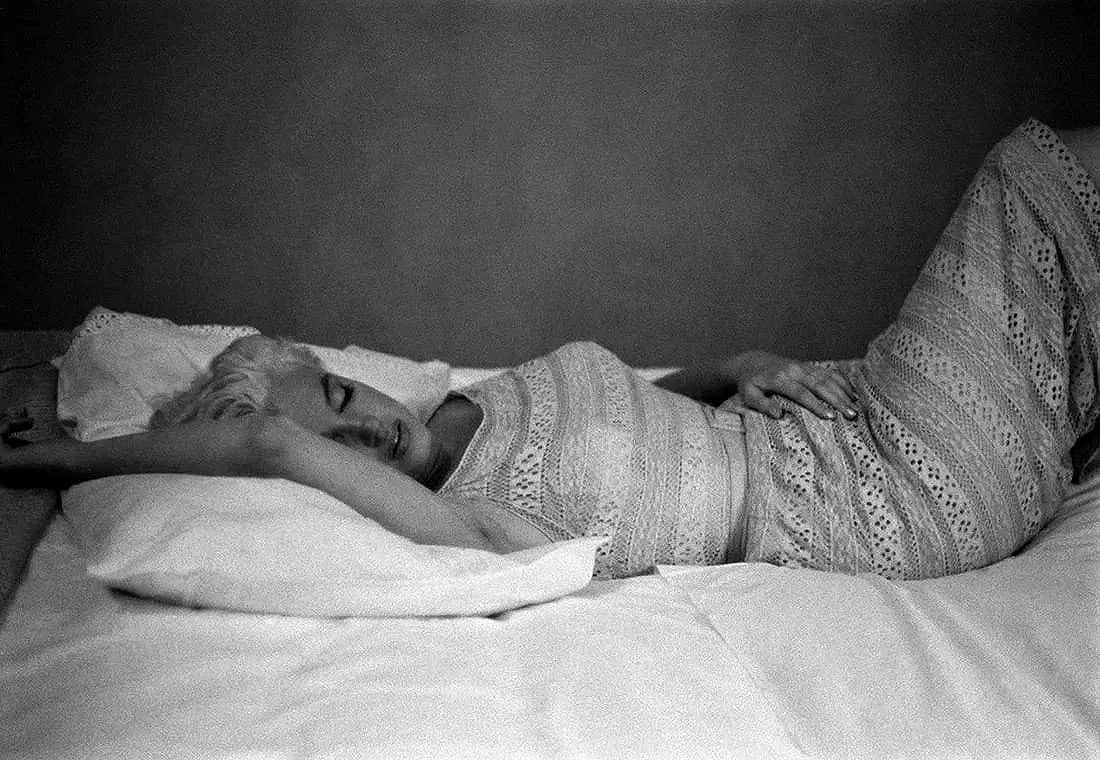 Eve Arnold (American, 1912-2012) Print: Eve Arnold (American, 1912-2012) Print. Marilyn Monroe in Illinois Resting, "1955". Printed in 1987, USA. 6.00 x 9.00 inches. Photomechanical Print. Lots that contain nudity have been partially