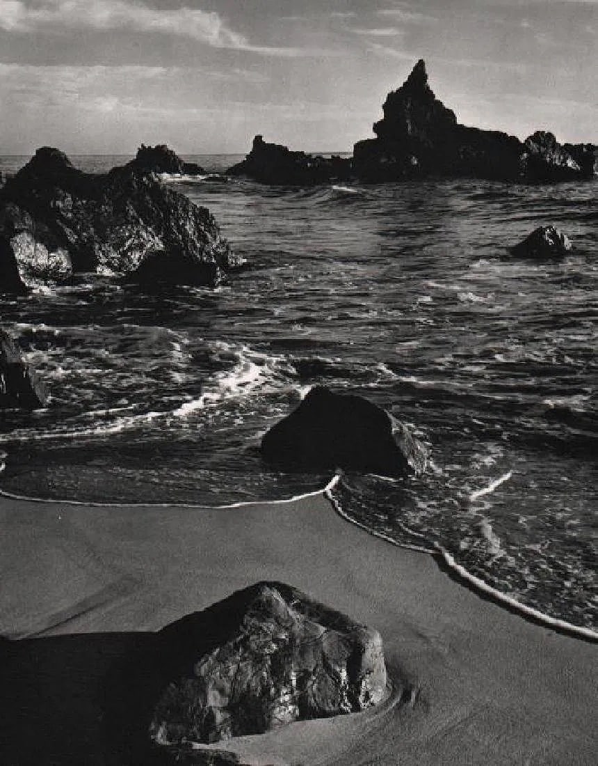 Ansel Adams (American, 1902-1984) Print: Ansel Adams (American, 1902-1984) Print. Surf. Printed in 1964, USA. 8.00 x 10.50 inches. Photogravure. Not hand-signed unless otherwise stated. Photomechanical Print. Lots that contain nudity have be