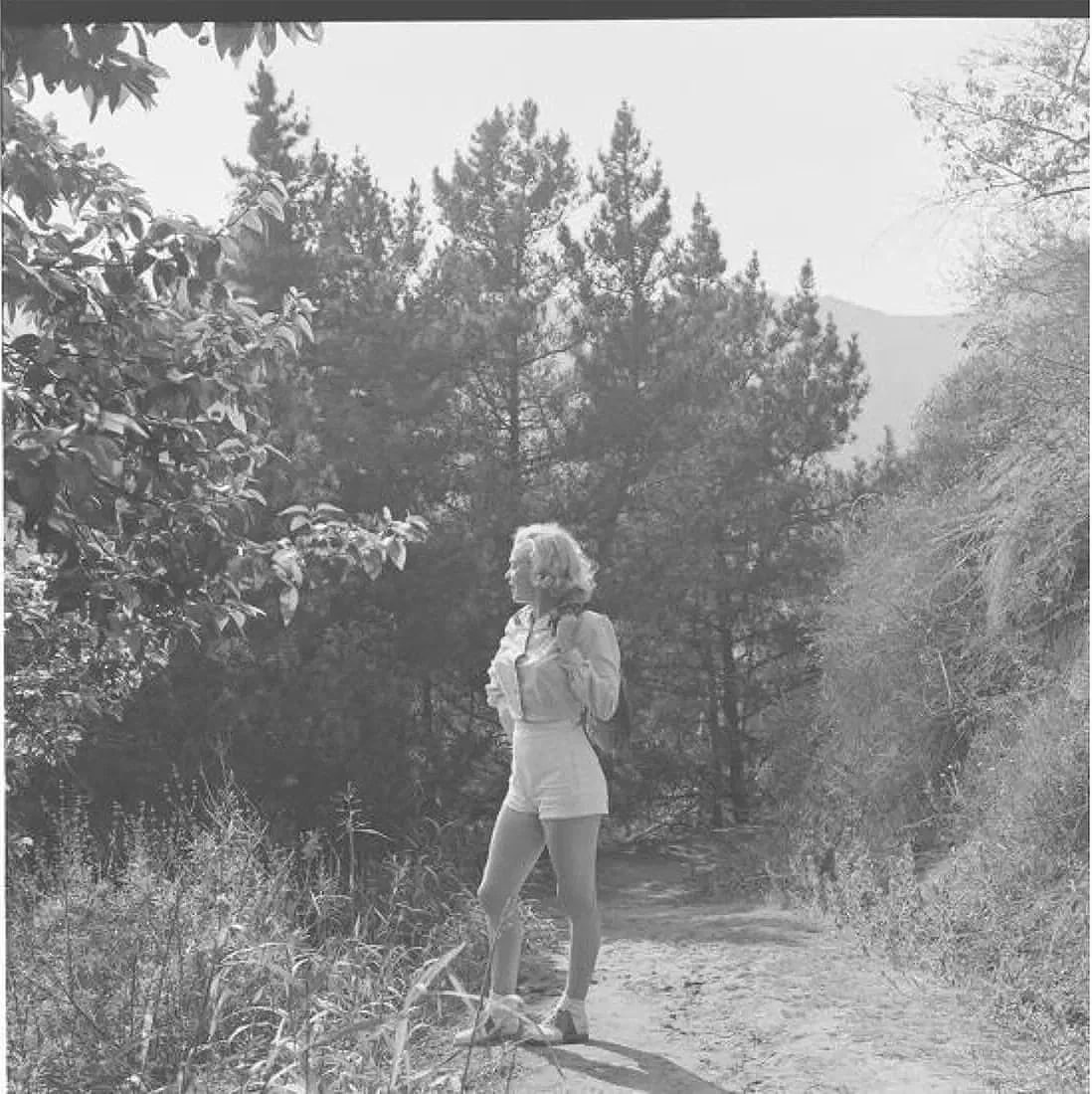 Ed Clark (American, 1926-2019) Print: Ed Clark (American, 1926-2019). Marilyn Monroe in California Photographic Print. 29.00 x 29.00 inches. Photomechanical Print. Lots that contain nudity have been partially obscured in the listing;